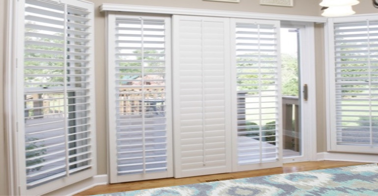 [Polywood|Plantation|Interior ]211] shutters on a sliding glass door in Boston